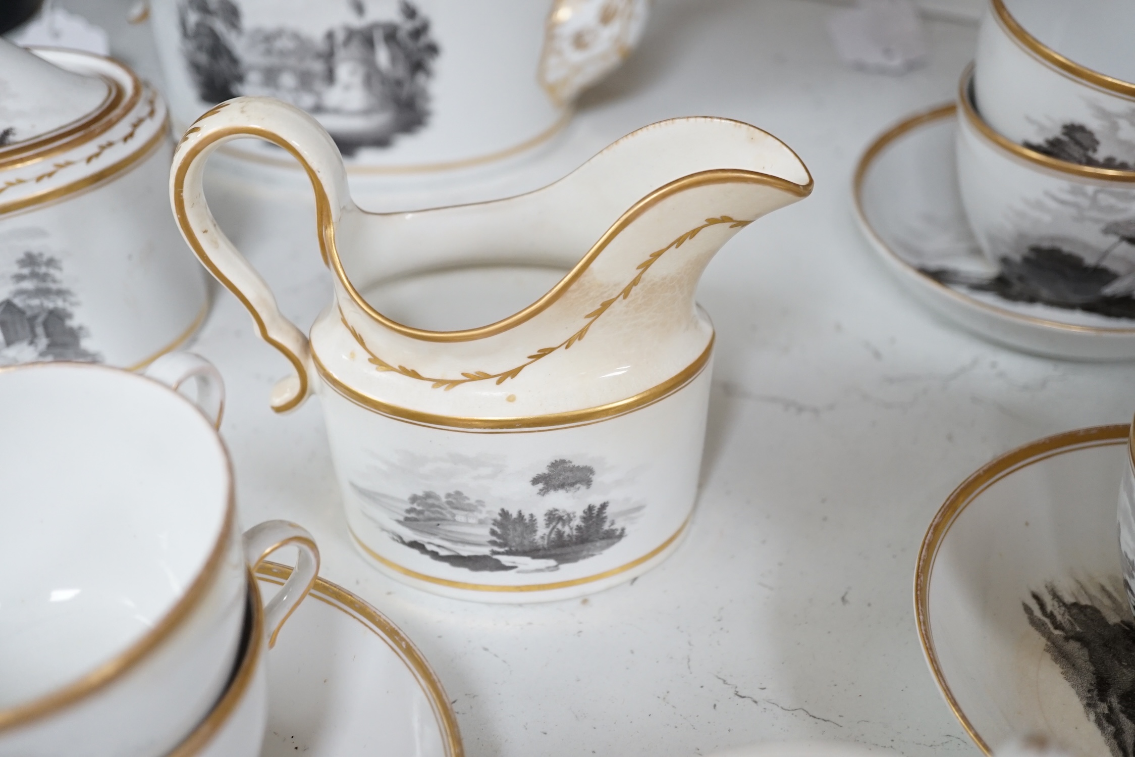 A Spode bat printed part tea / coffee set, c.1802, including pattern 557, largest 26cm wide. Condition - varies, poor to fair